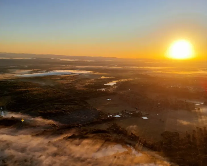 Sunset over land