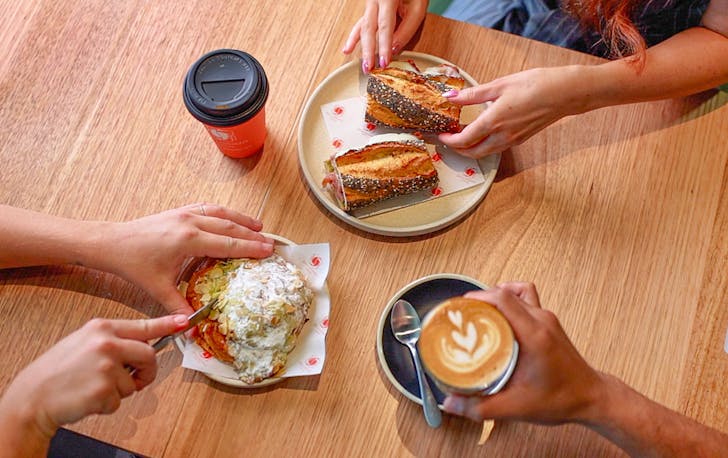 Hands touching food