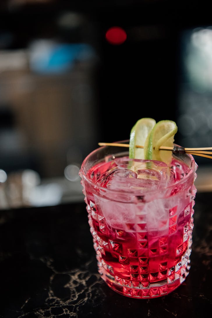 a close up of a red cocktail