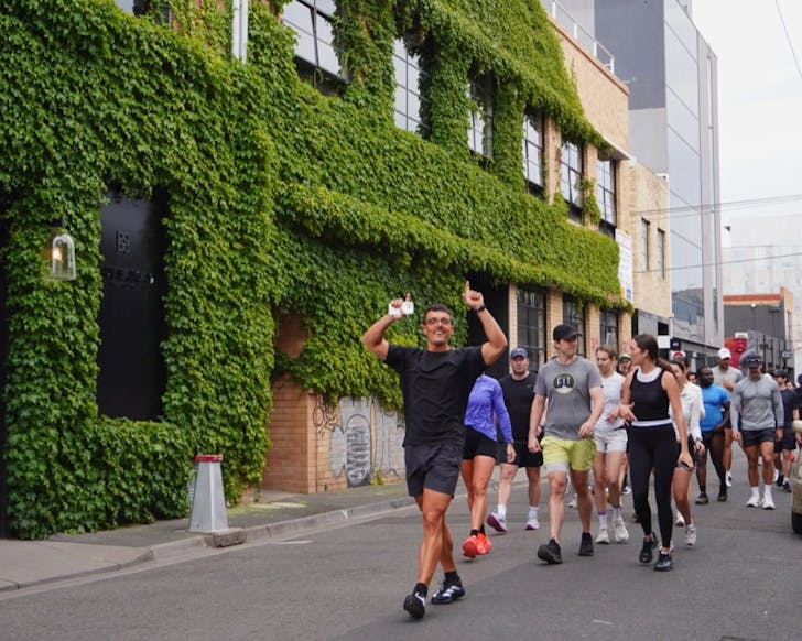 Group of people dancing and running