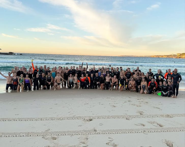 Group posing on beach