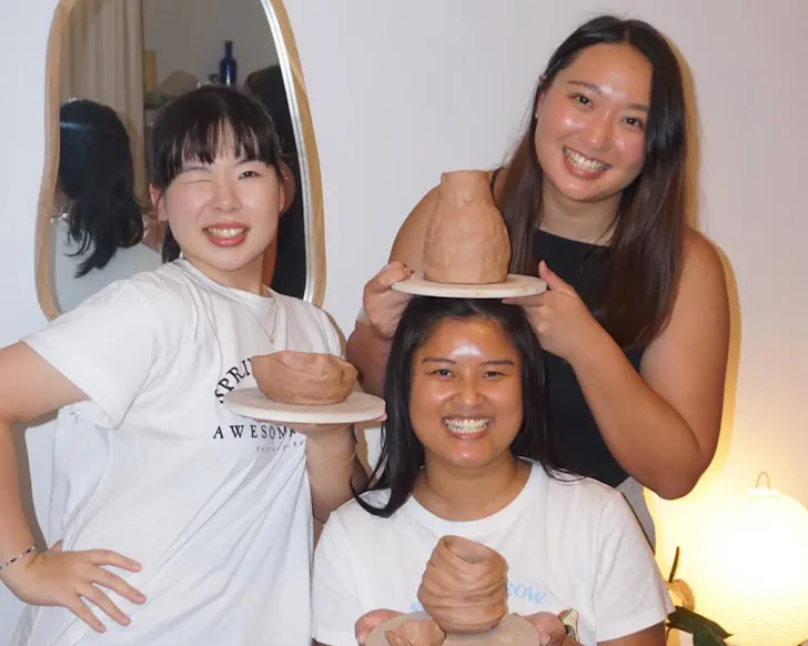 Three people posing
