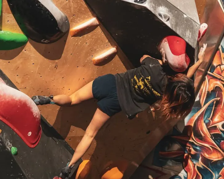 Person climbing wall