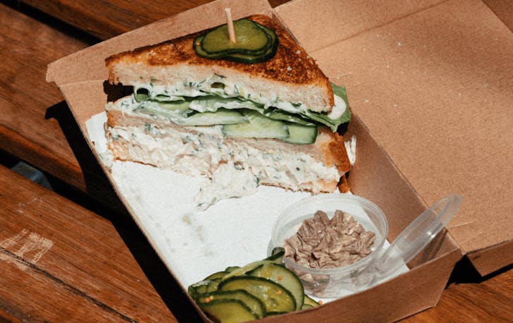 A sandwich in a take-away tray at a top essendon restaurant. 
