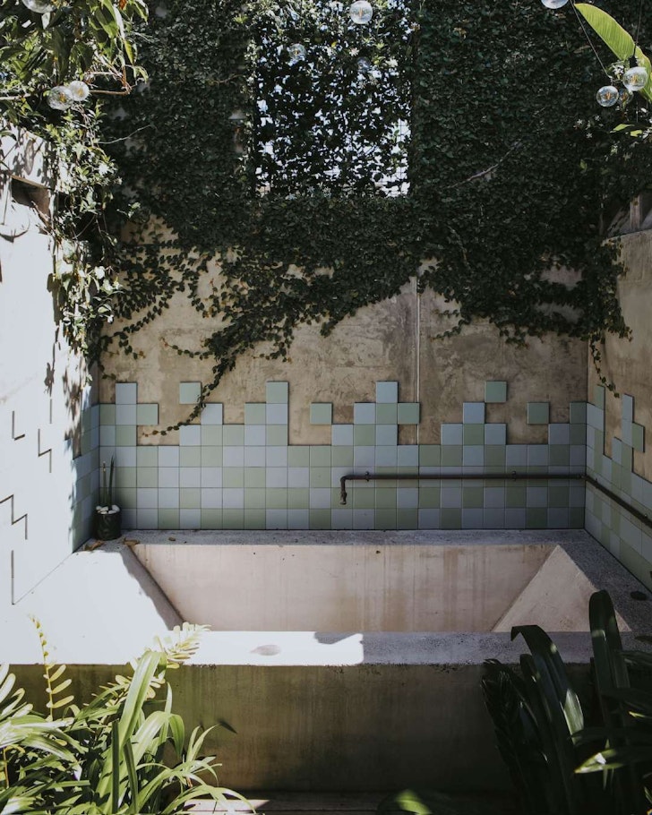 A view of the rustic outdoor bath at The Banksia House near Brisbane Queensland