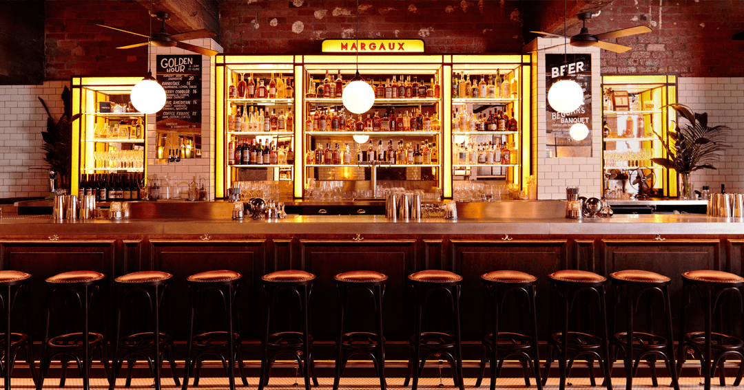 A warmly lit bar space at one of the best bars in Melbourne has on offer, Bar Marqaux.