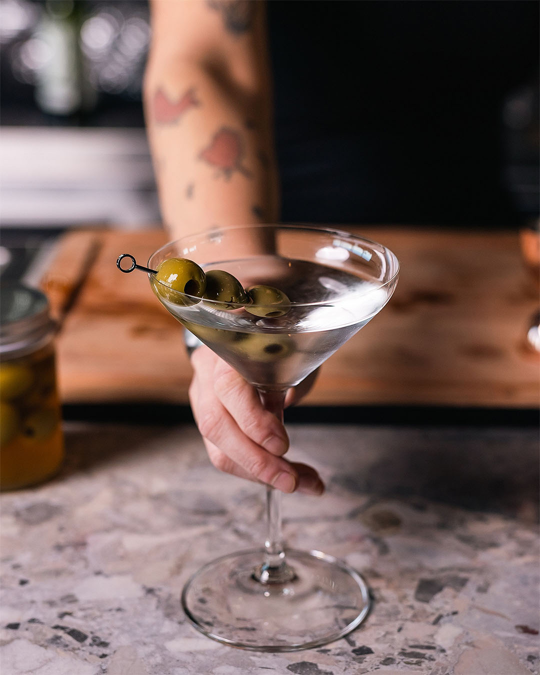 Someone slides over a dirty martini at Bar Albert, definitely one of the best bars in Auckland CBD.
