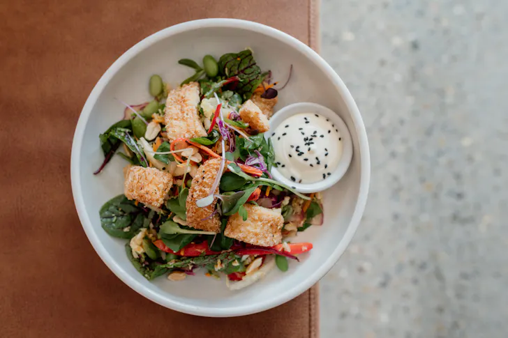 a close up of a crispy squid salad