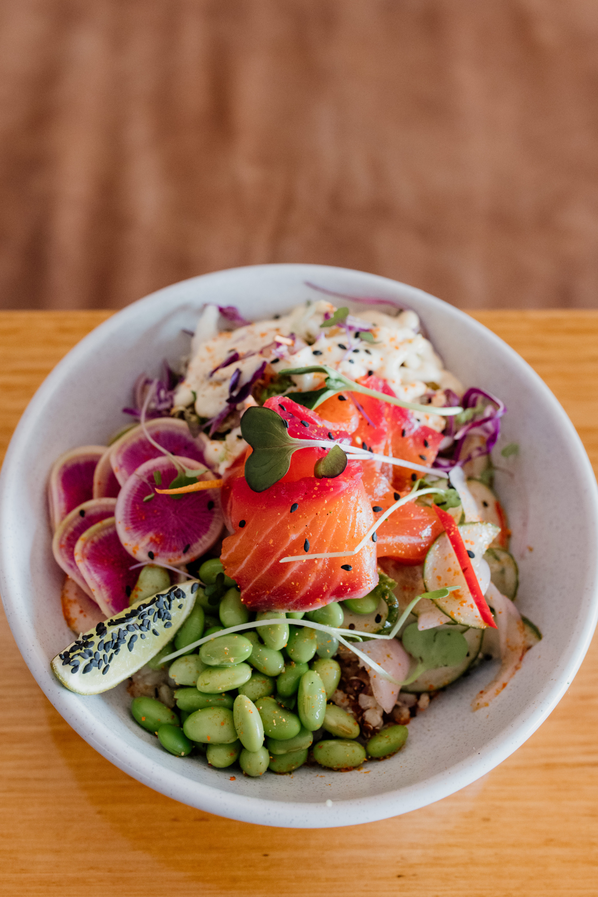a close-up of a salmon bowl