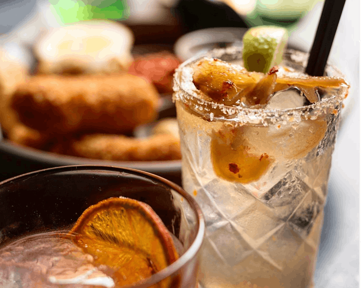 A glistening cocktail and tapas you just want to rip into at Barulho, one of the best eateries in Parnell. 