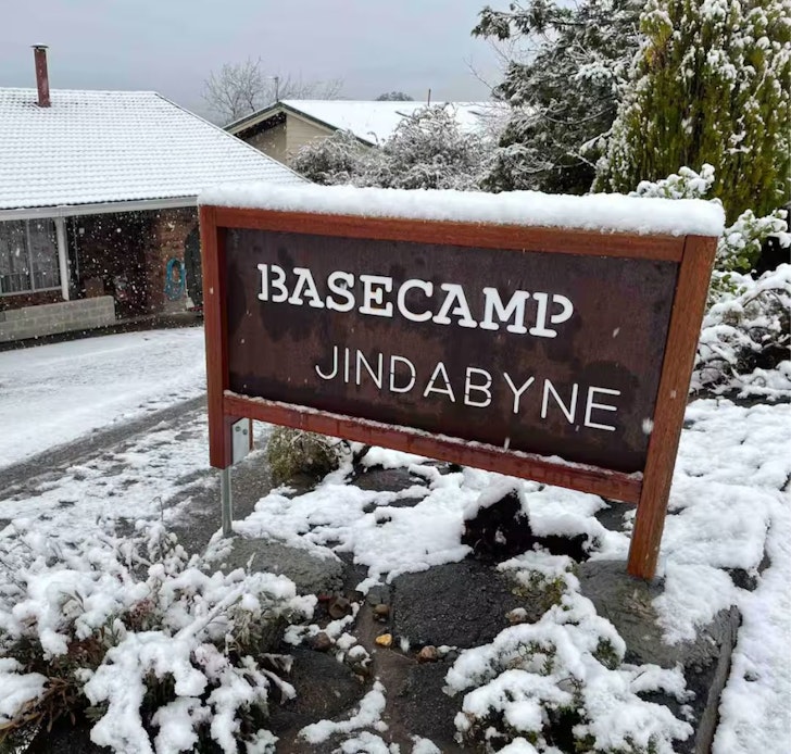 The sign for Base Camp Jindabyne one of the best accommodation options near Jindabyne