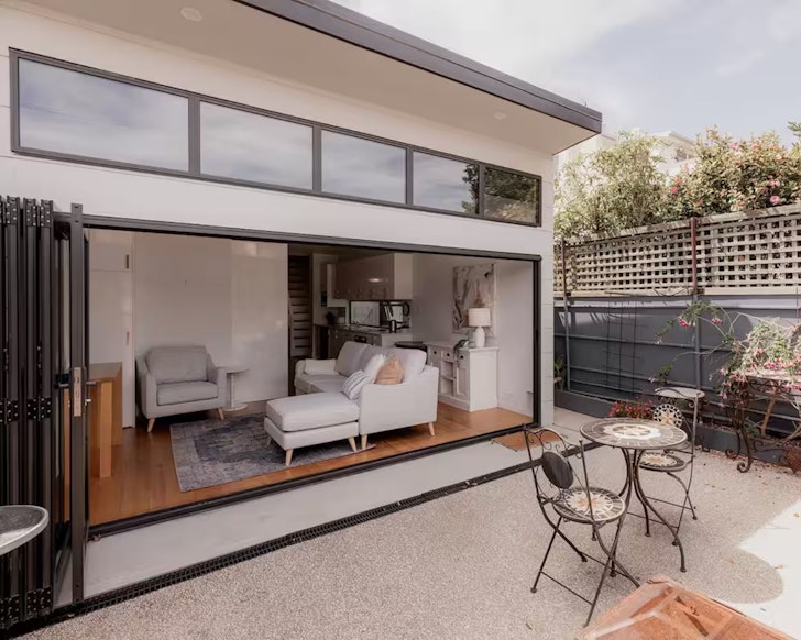 A view of the living space from the outdoor area at Battery Point Place one of the best Airbnbs in Hobart