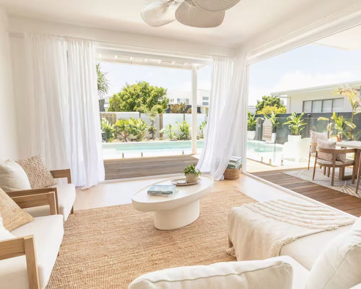 The lounge with pool in background at Beach House large group Airbnb on Sunshine Coast