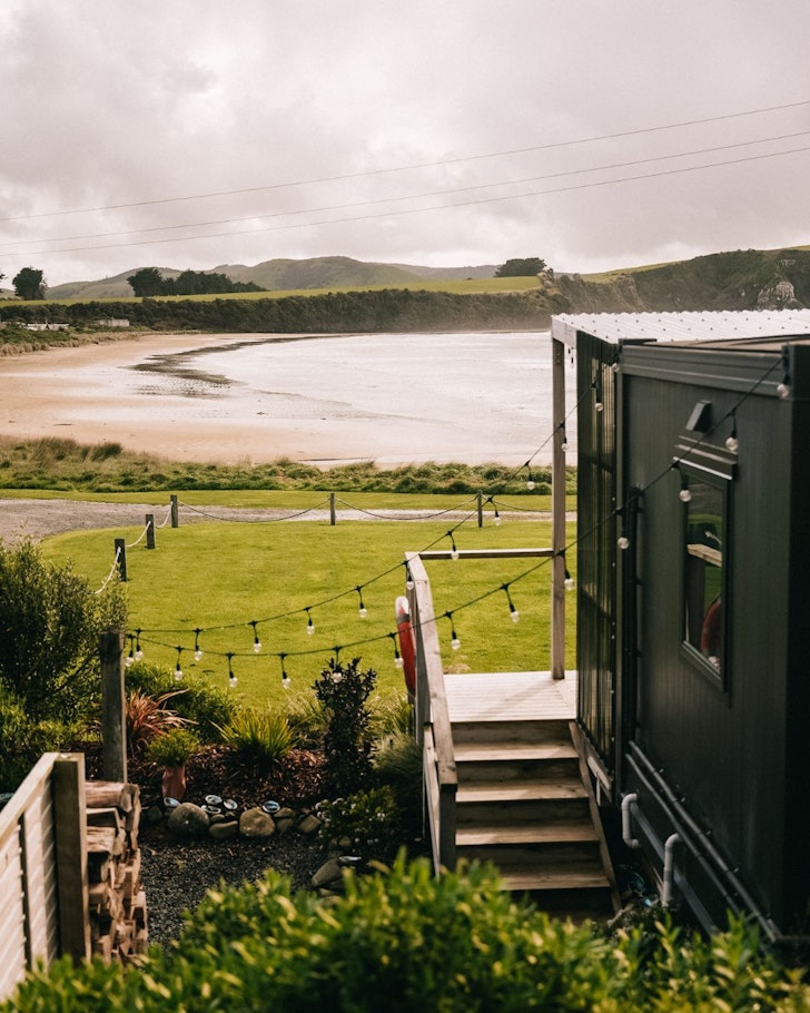 A view of the beach from Beach Front Oasis best beach house Airbnbs NZ