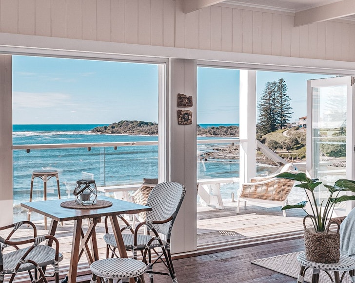 A view to the ocean from the living space at The Beach House Studio one of the best Yamba Airbnbs
