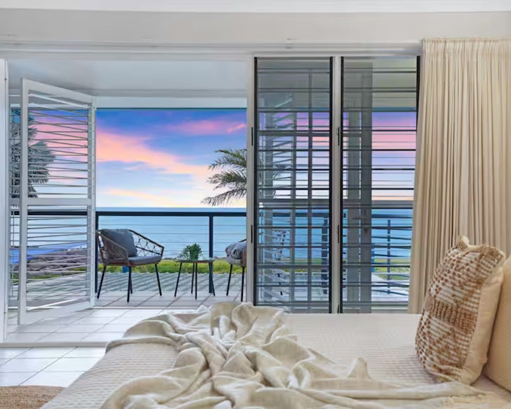 A view out to sea from the bedroom at Beachside Retreat in Cullen Bay one of the best Darwin Airbnbs