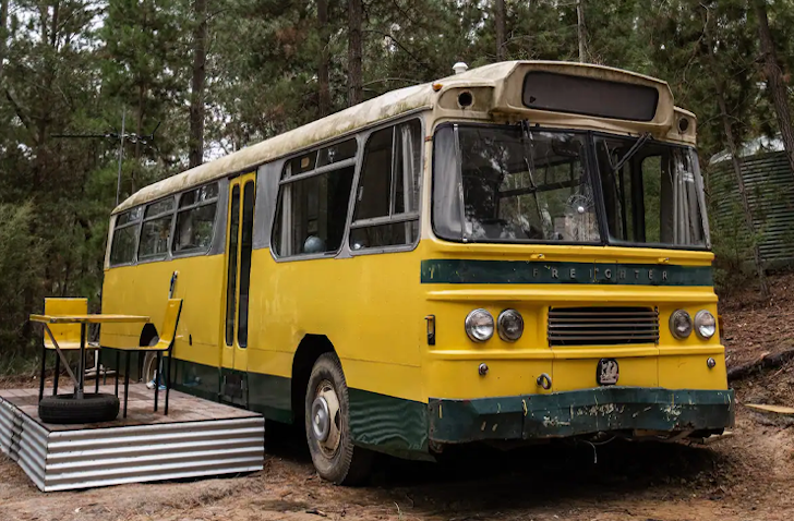 A view of the yellow tiny home in a bus in Victoria
