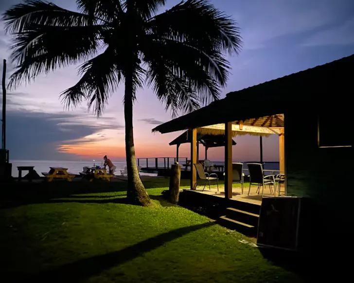 An external view at sunset of Belles On Ballow best accommoation Stradbroke Island