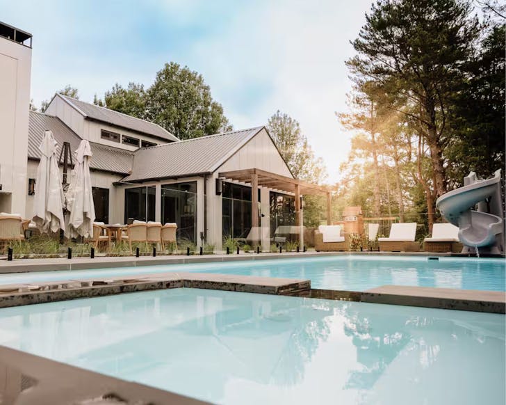 A view of the pool and slide at Berry Luxury Barn House Airbnb for large groups NSW