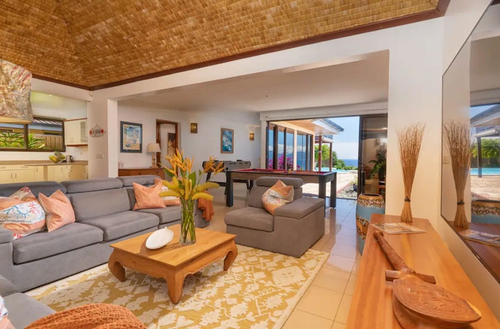 The living room of Beautiful 5 Bedroom Villa, one of the best Airbnbs in Tahiti