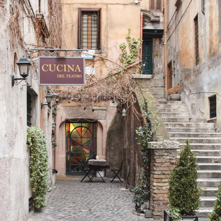 Best gelato in Rome at Gelateria del Teatro with charming storefront on a cobblestone street
