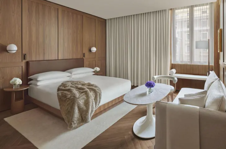 Best hotels in Rome at The Rome EDITION with modern bedroom interior and wood panelled design