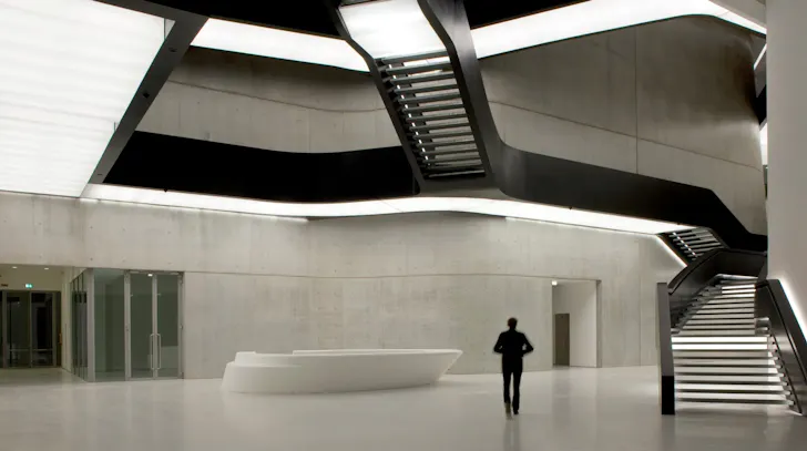 Inside Romeâs MAXXI Museum featuring Zaha Hadidâs flowing concrete design and sculptural staircases