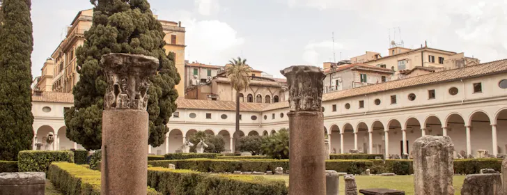 Courtyard at Palazzo Altemps in Rome with ancient Roman columns and sculptures set within a Renaissance cloister