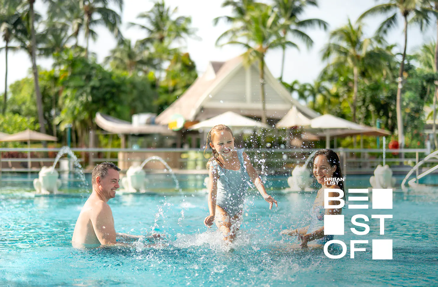A family in the pool at Shangri-La Rasa Sentosa