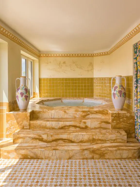 Best places to stay in Rome at Casa Monti with a statement marble tub and warm, art-filled interiors in Monti