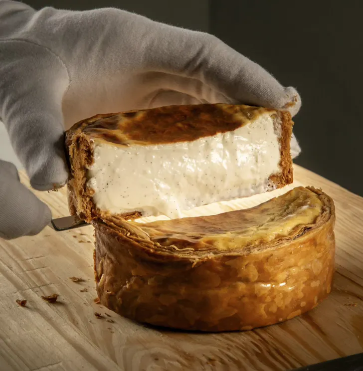 Best restaurants in Rome at Zia with a crispy, vanilla filled flan being cut in half