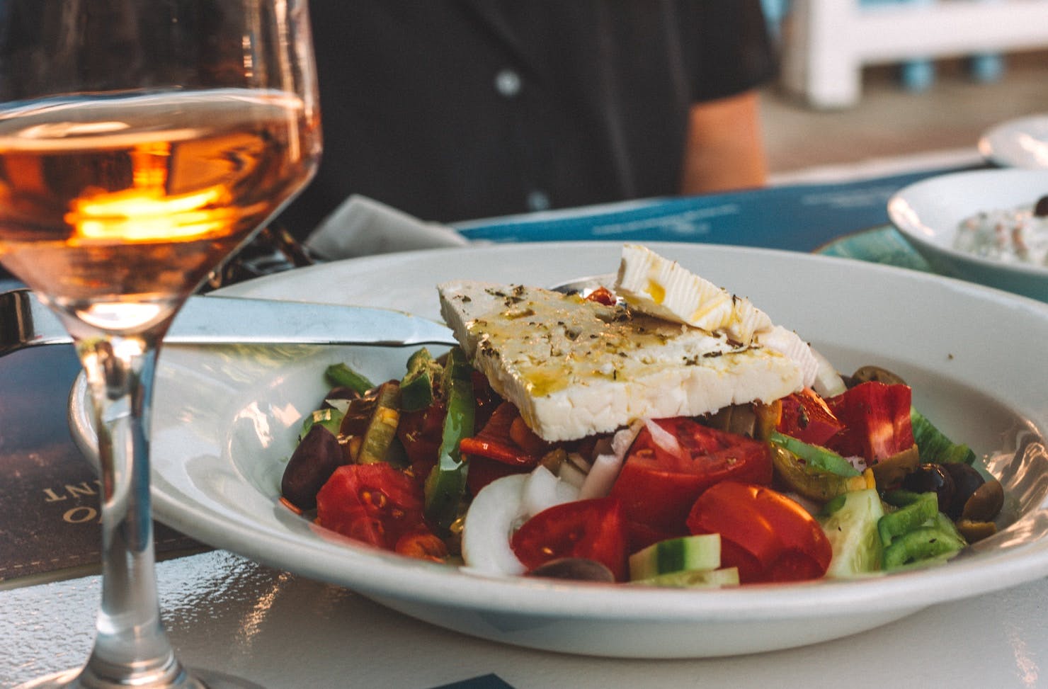 Greek Salad and a glass of wine