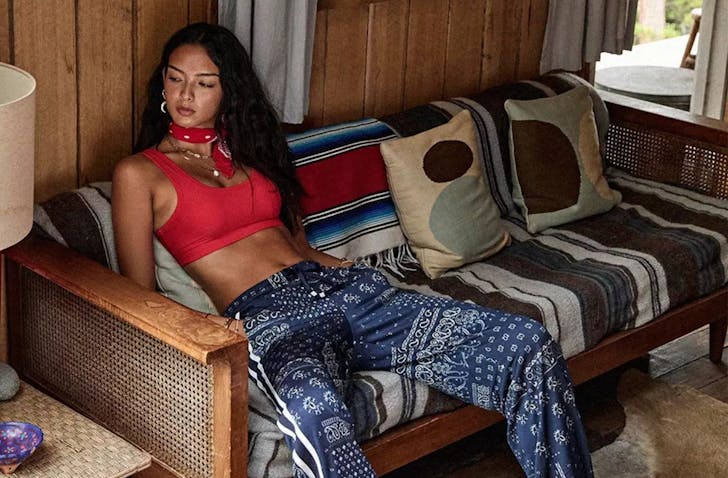 A woman wears clothes from The Upside one of the best activewear brands