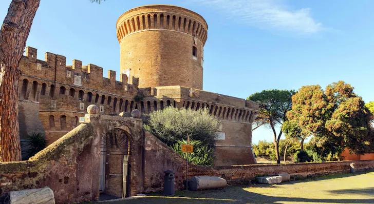 Best day trips from Rome in Ostia Antica with an ancient fortress and ruins and surrounding greenery