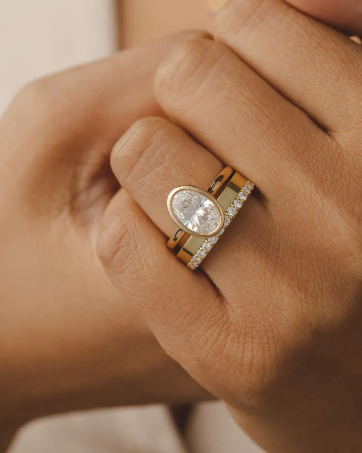 A bezel engagement ring by KAVALRI