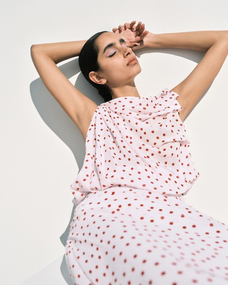 A model wears a polkadot dress from Bianca Spender one of the best Australian fashion labels