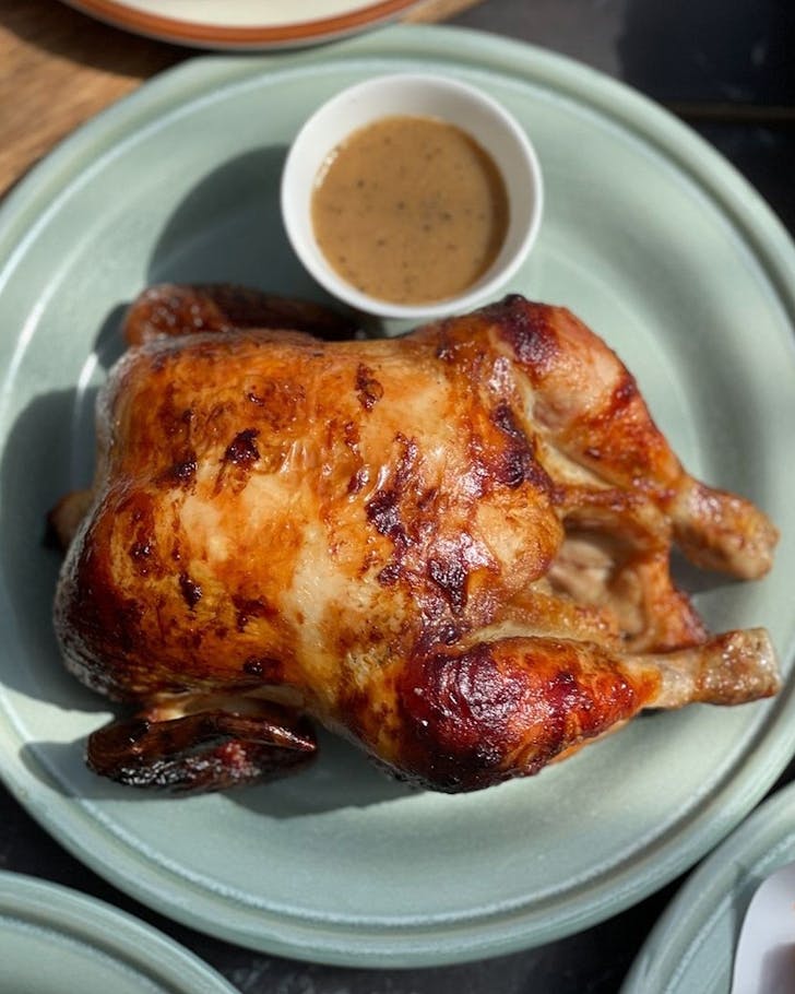 A roast chicken at Bird On A Wire.