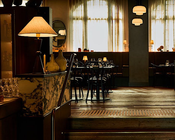 Moody, French-inspired interiors at restaurant, Bistro Saine.