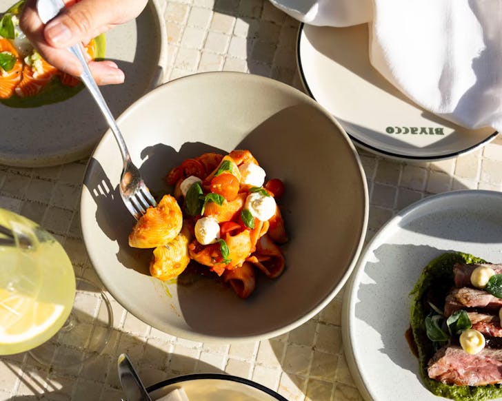 A spread of lush looking dishes at Bivacco. 