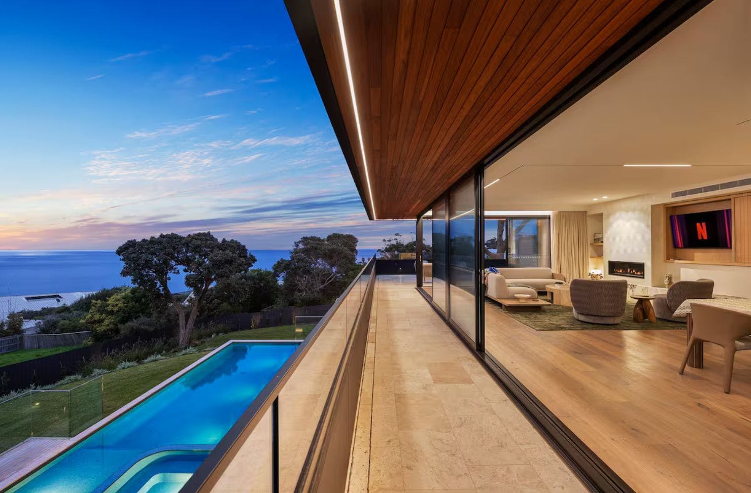A view of the living space overlooking the sea at Blanc de Noir luxury Airbnb accommodation Mornington Peninsula