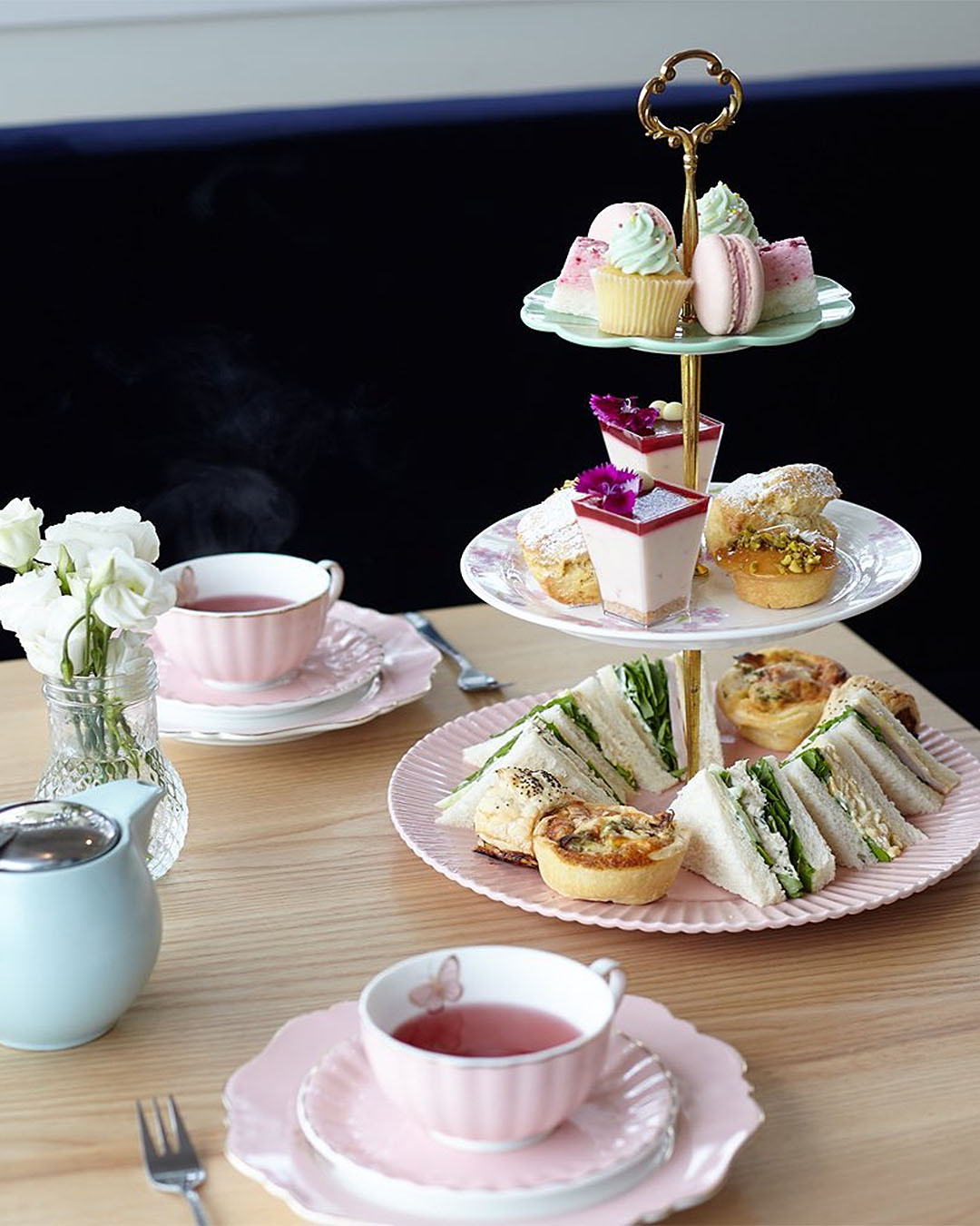 A delicious tower of food at Bluebells Cakery, one of the best high teas in Auckland.