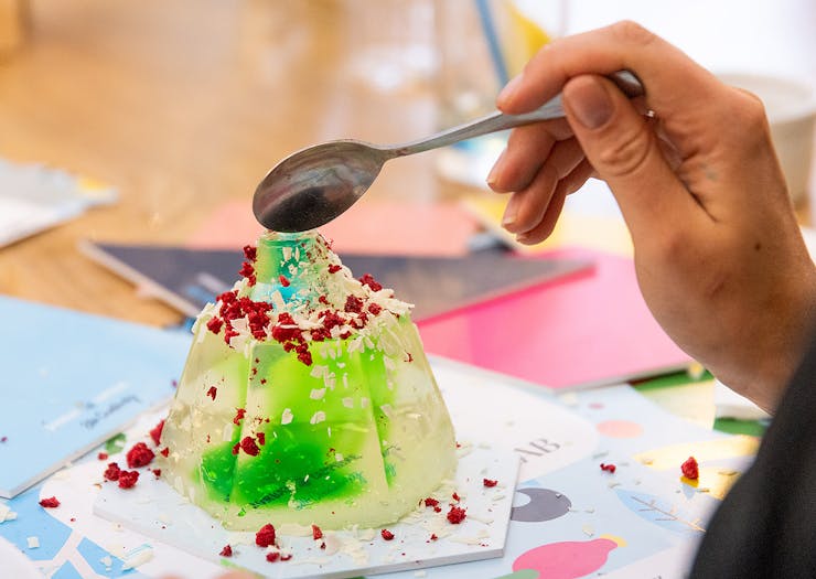 A spoon dives into a jelly creation.