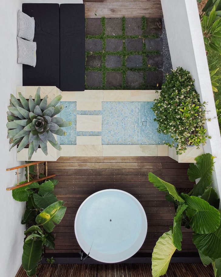 An aerial view of the courtyard at Boutique Luxury Private Abode one of the best Sunshine Coast stays with outdoor baths