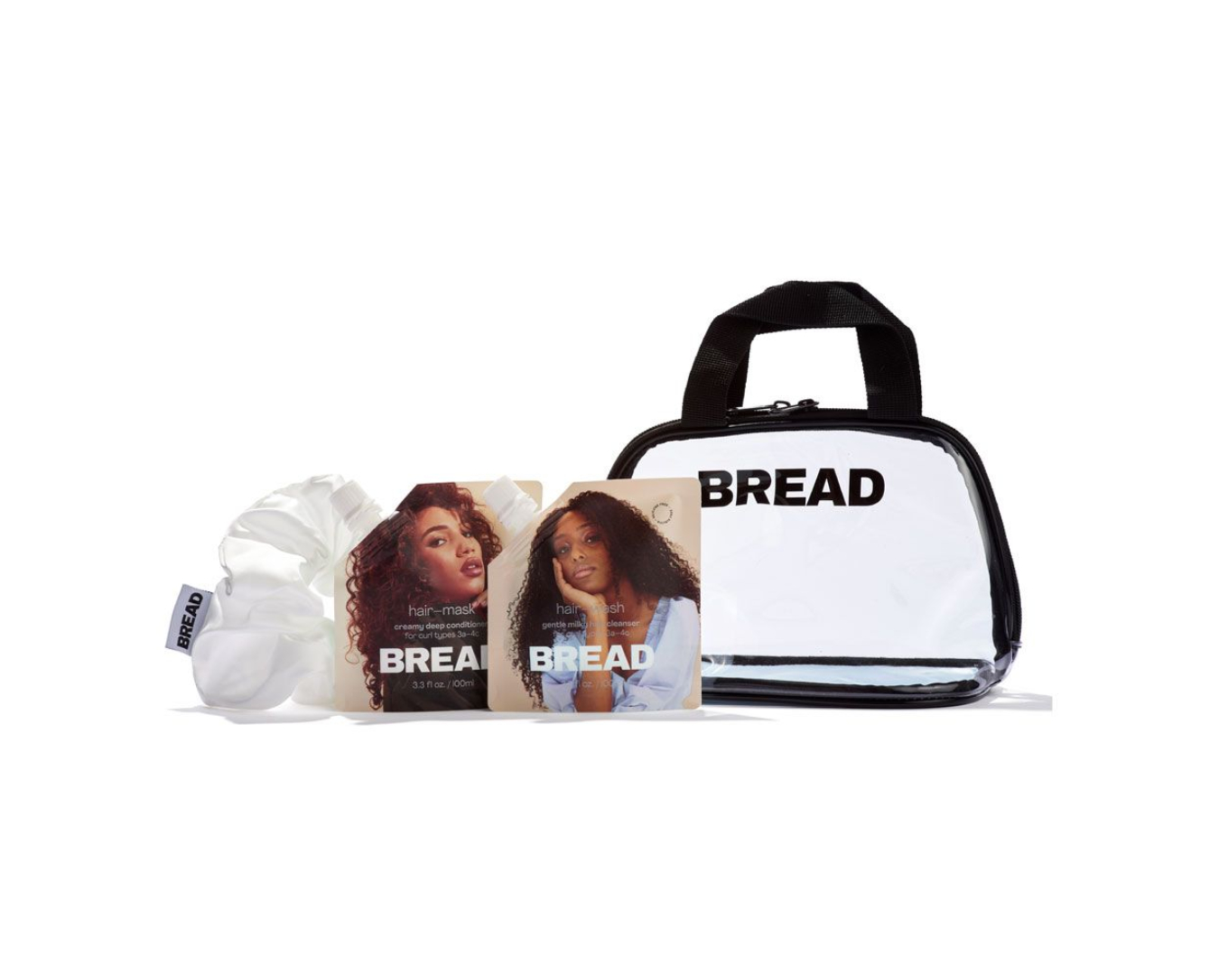 Two pouches of hair products with images of women on them, a white scrunchie and a clear vinyl handbag with black detailing and 'BREAD' written across the front.