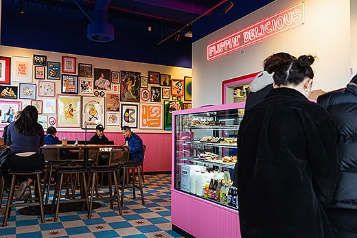 The bustling interior of Breakfast Club.