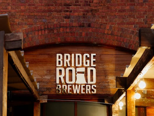 A brick wall with a sign that reads 'Bridge Road Brewers'