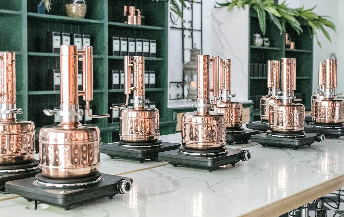 the copper stills inside the distillery's gin school