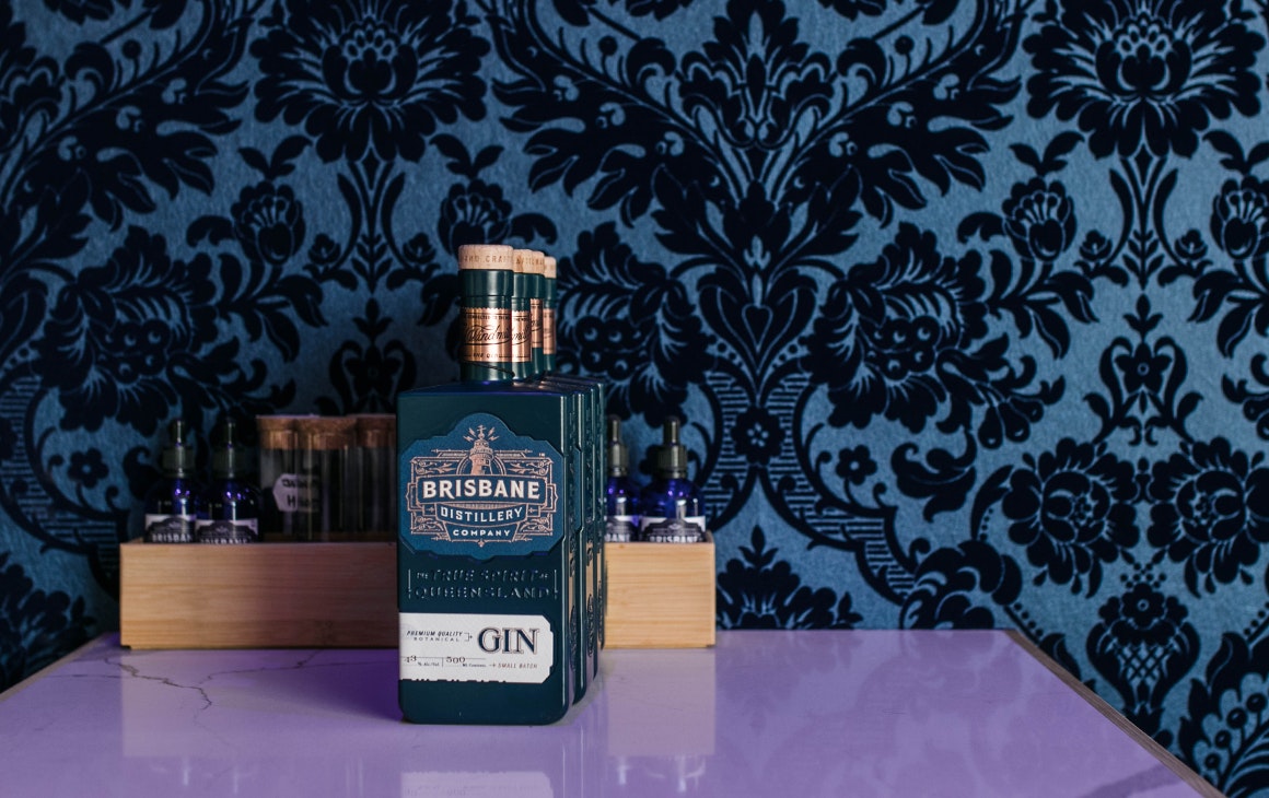 a gin bottle standing on the bar