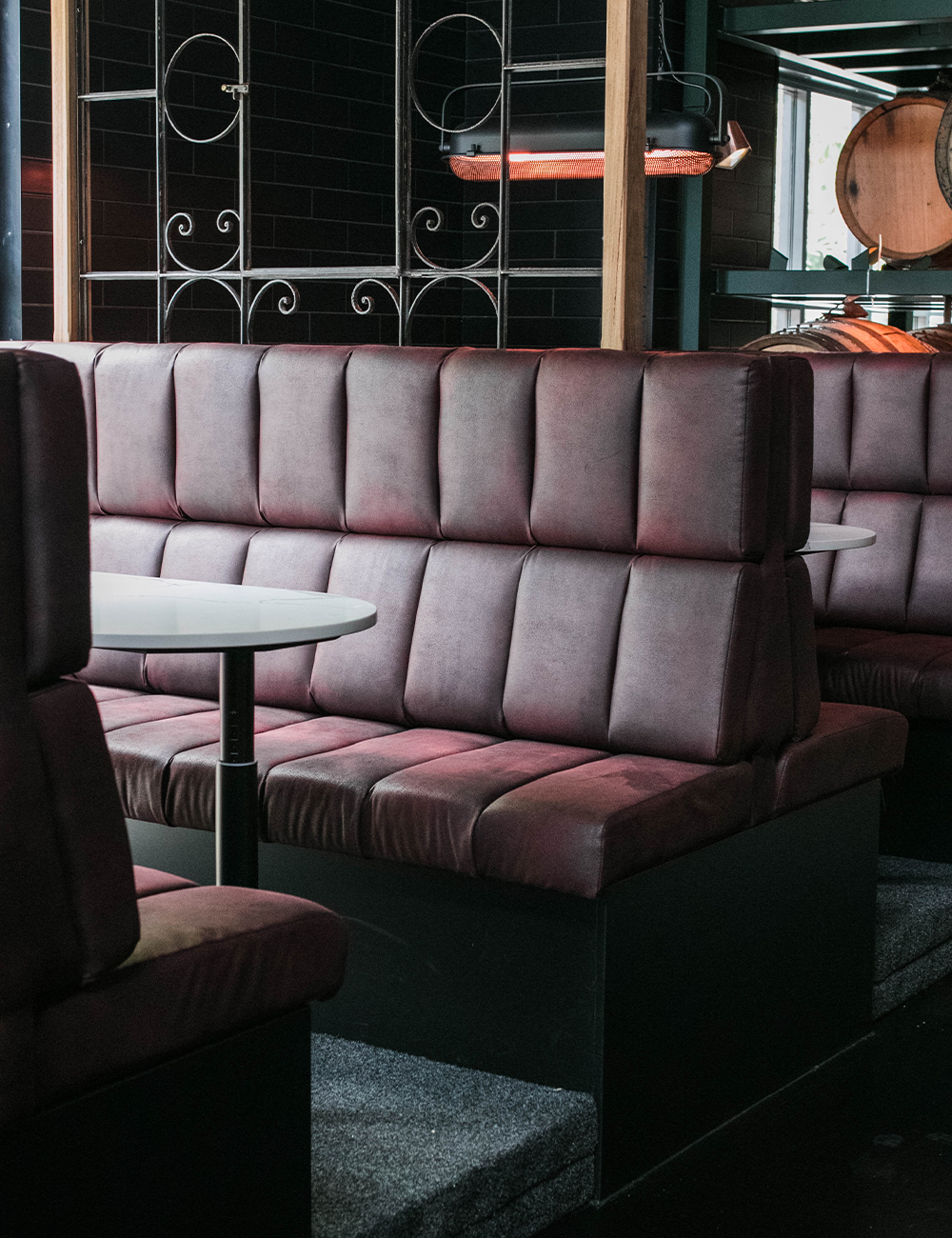 a leather booth inside the bar