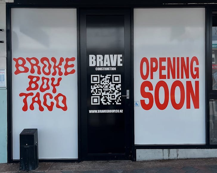 A shopfront with the words Broke Boy Taco Coming Soon.